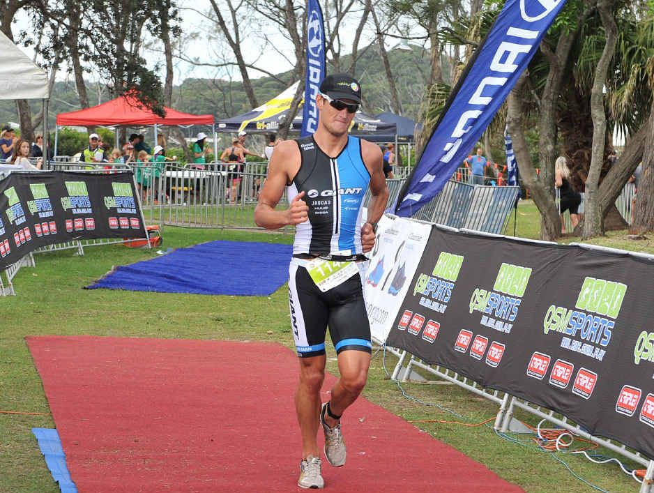 TOP RESULT: Clayton Fettell of Lennox Head crosses the line to win the Byron Bay Triathlon. TOP RESULT: Clayton Fettell of Lennox Head crosses the line to win the Byron Bay Triathlon.